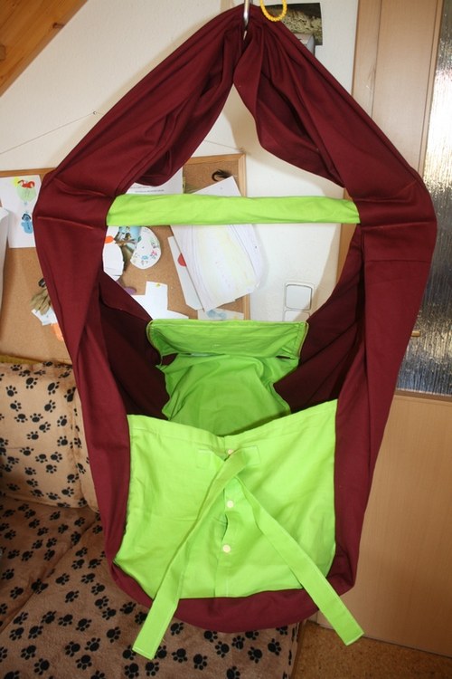 Došití jisticích tkanic na chlopně hačky